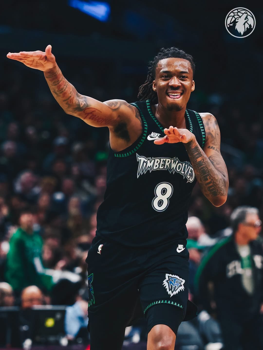 Timberwolves #8 celebrating in the classic black throwback jersey